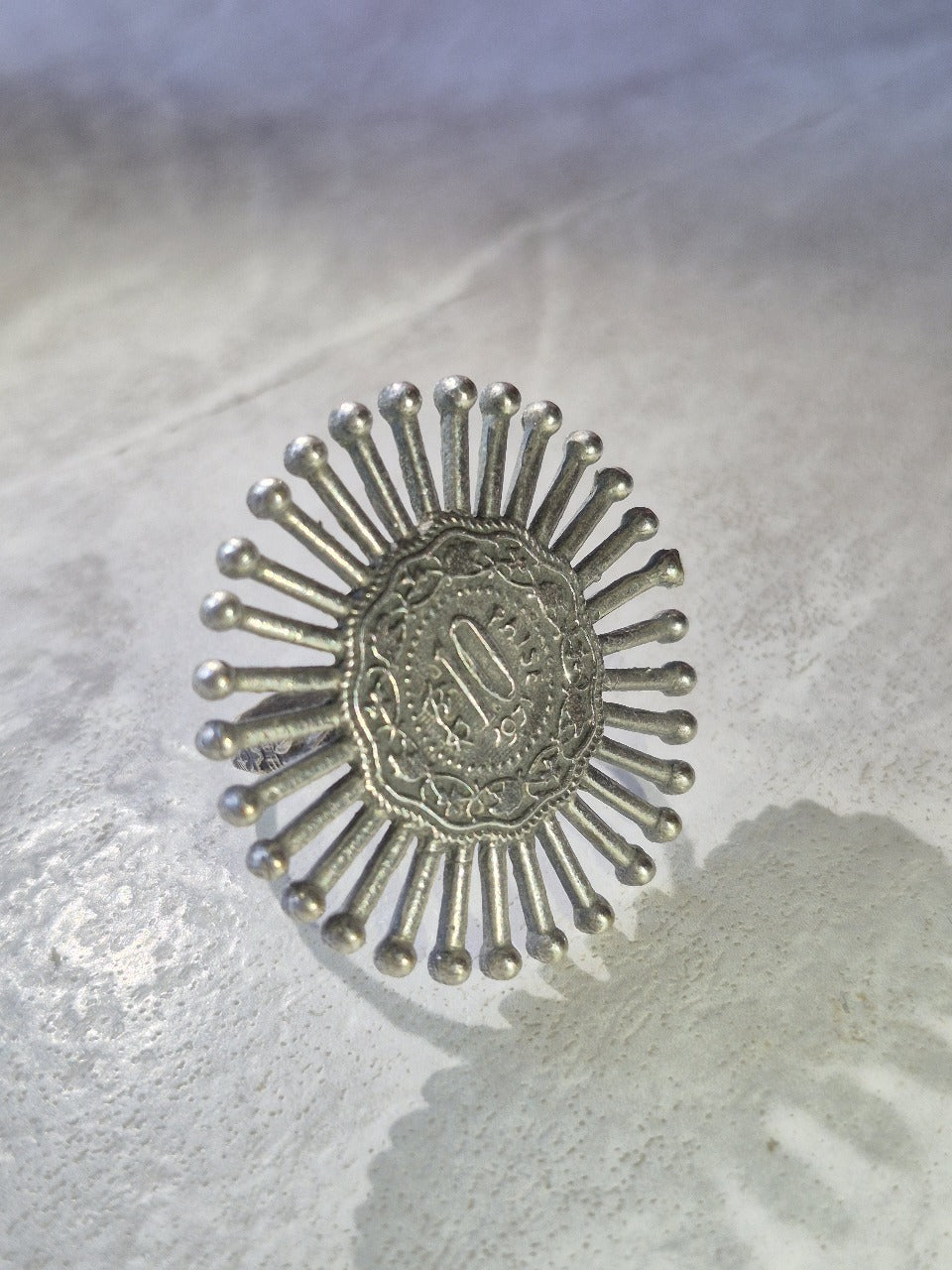 Sunburst Brass Ring with Intricate Design